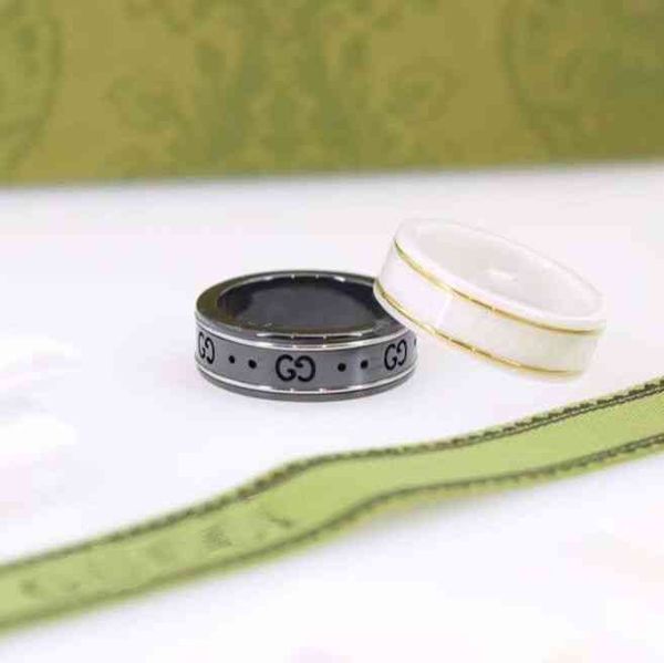 2023 designer new jewelry sterling silver black and white ceramic double letter hand couple ring
2023 designer new jewelry sterling silver black and white ceramic double letter hand couple ring
