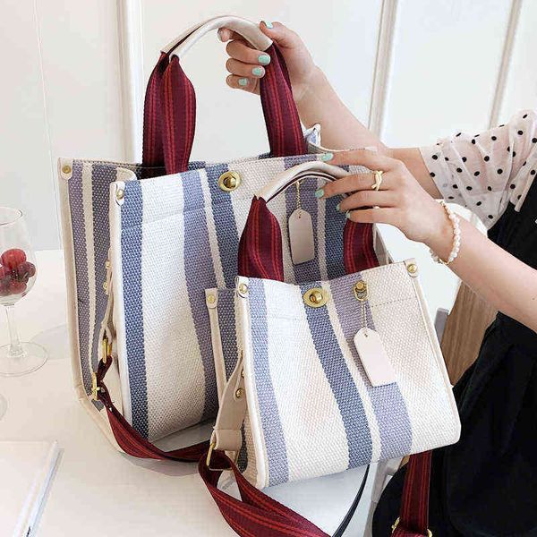 evening bags large tote casual stripe canvas handbag for women wide shoulder strap female 2022 trendy texture commuter 220516
evening bags large tote casual stripe canvas handbag for women wide shoulder strap female 2022 trendy texture commuter 220516