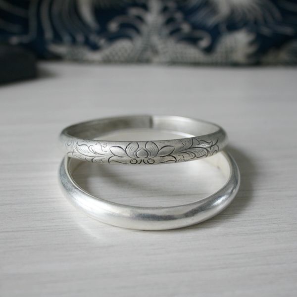 new ethnic style handmade miao silver carved lotus plain surface open-ended bracelet fashion all-match imitation old silver simp
new ethnic style handmade miao silver carved lotus plain surface open-ended bracelet fashion all-match imitation old silver simp