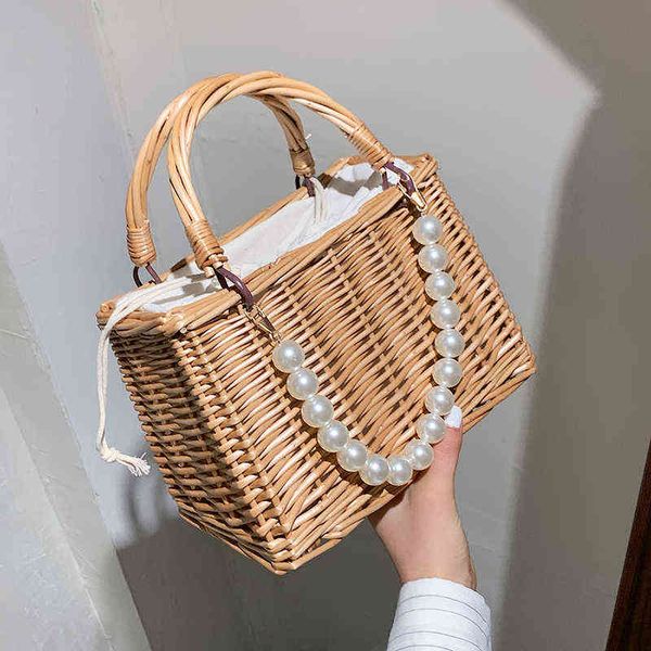 shopping bags summer beach tote for women luxury pearl chain rattan lady mini straw shoulder fashion designer small handbags 220318
shopping bags summer beach tote for women luxury pearl chain rattan lady mini straw shoulder fashion designer small handbags 220318