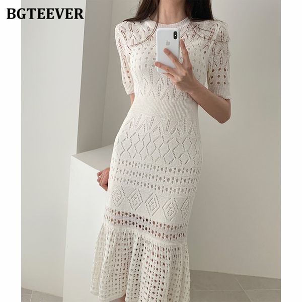 elegant o-neck sheath dress female chic hollow out short sleeve midi dress for women summer knitted vestidos femme 2022, Black;gray
elegant o-neck sheath dress female chic hollow out short sleeve midi dress for women summer knitted vestidos femme 2022, Black;gray