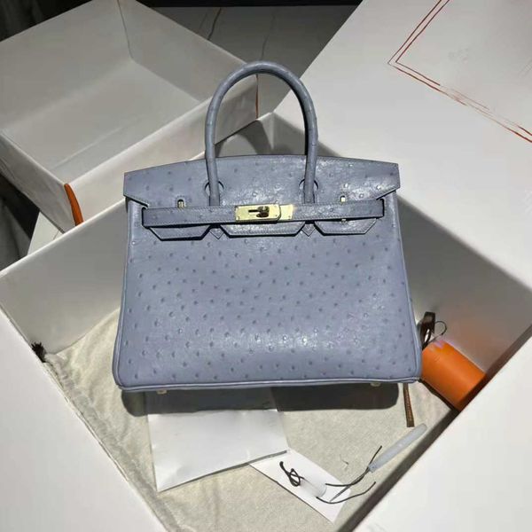 new h home premium macarone grey ostrich 3025mini bag portable togo leather litchi pattern
new h home premium macarone grey ostrich 3025mini bag portable togo leather litchi pattern