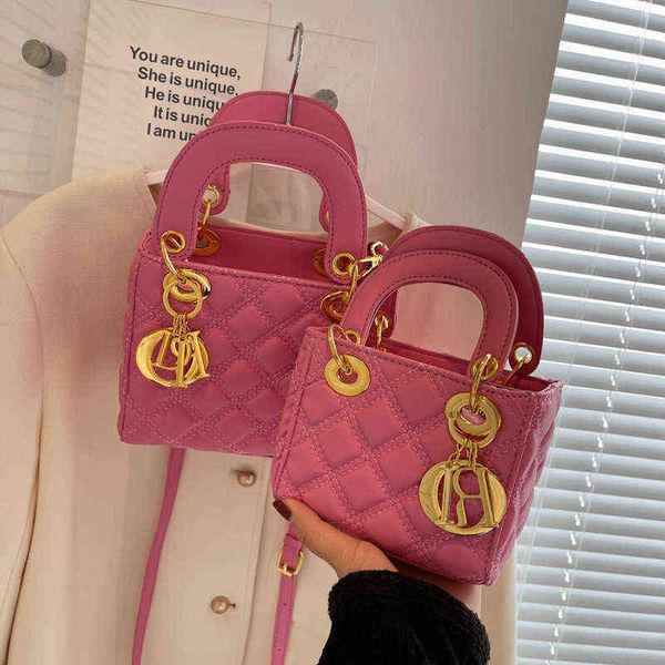 factory online export designer tide brand ladies bag portable small female summer 2022 new girl square personality style fashion msenger
factory online export designer tide brand ladies bag portable small female summer 2022 new girl square personality style fashion msenger