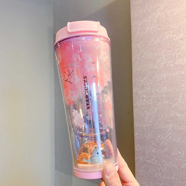 new starbucks cup 2022 cherry blossoms, birds and flowers, plastic cup, pink desk covered accompanying water cup
new starbucks cup 2022 cherry blossoms, birds and flowers, plastic cup, pink desk covered accompanying water cup