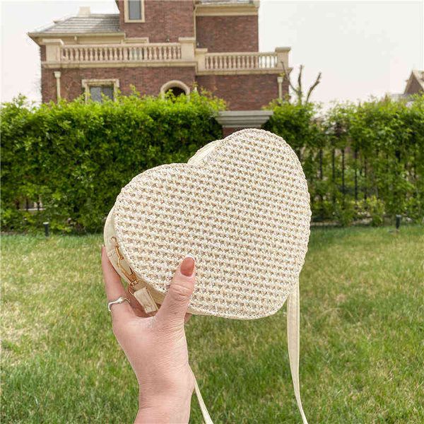 summer woven little girl's bag korean sober foreign style love shape straw one shoulder slant span
summer woven little girl's bag korean sober foreign style love shape straw one shoulder slant span
