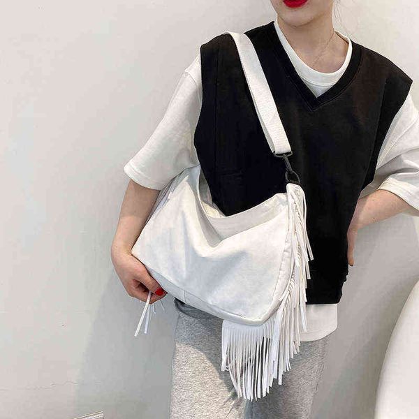 aliwood new japanese style tassel women's bag large capacity canvas shoulder bags fringed female crossbody bags student handbags g22051
aliwood new japanese style tassel women's bag large capacity canvas shoulder bags fringed female crossbody bags student handbags g22051