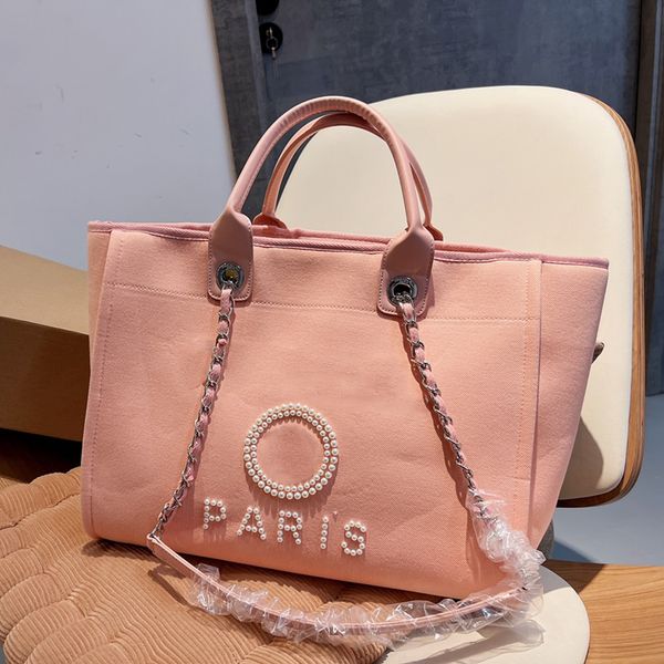fashion beach bags ladies designer pearl embroidery design leather handle oblique large capacity shoulder bag spring temperament casual styl
fashion beach bags ladies designer pearl embroidery design leather handle oblique large capacity shoulder bag spring temperament casual styl