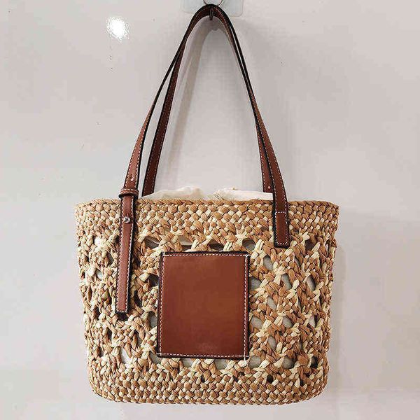 luxury designer wicker rattan basket bag women handbags hollow straw s for bohemian travel beach shoulder tote 220617
luxury designer wicker rattan basket bag women handbags hollow straw s for bohemian travel beach shoulder tote 220617