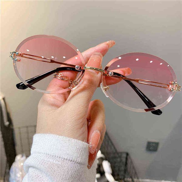sunglasses for woman summer rimless cut-edge sunglass oval fashion designer shades pink women's sun glasses uv400, White;black
sunglasses for woman summer rimless cut-edge sunglass oval fashion designer shades pink women's sun glasses uv400, White;black