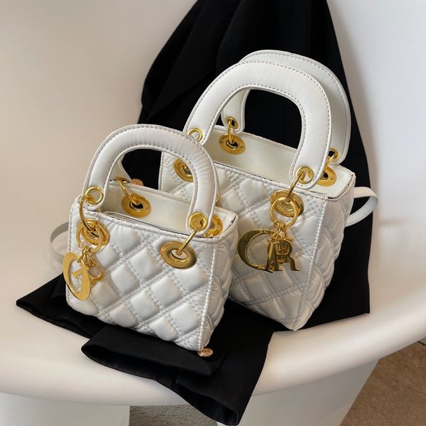 new designer bags female 2022 style small square fashion light luxury lingge handbag single shoulder messenger
new designer bags female 2022 style small square fashion light luxury lingge handbag single shoulder messenger