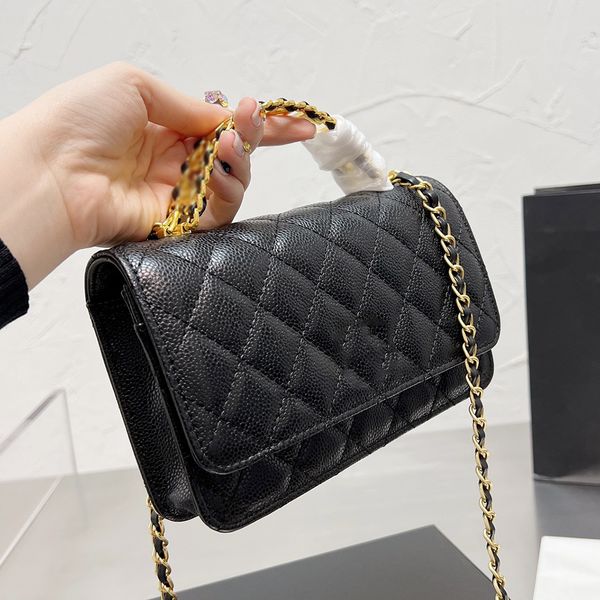 ladies solid color woc handle totes bags caviar flap mini crossbody designer bags cowhide gold-tone metal chains diamond quilting shoulder b 
ladies solid color woc handle totes bags caviar flap mini crossbody designer bags cowhide gold-tone metal chains diamond quilting shoulder b