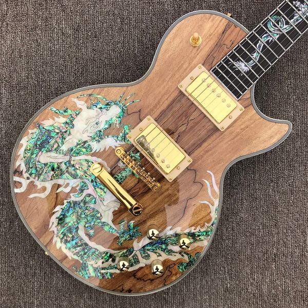 custom lp electric guitar, gold hardware, dragon abalone inlaid rosewood fingerboard, dinosaur abalon decaying wood solid mahogany body gui
custom lp electric guitar, gold hardware, dragon abalone inlaid rosewood fingerboard, dinosaur abalon decaying wood solid mahogany body gui