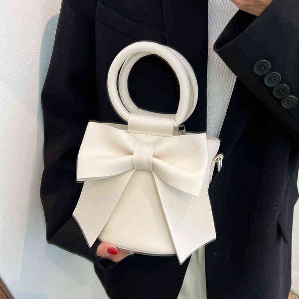 evening bags bow tie round handle design mini pu leather crossbody side for women 2022 summer fashion shoulder handbag cute totes 220428
evening bags bow tie round handle design mini pu leather crossbody side for women 2022 summer fashion shoulder handbag cute totes 220428
