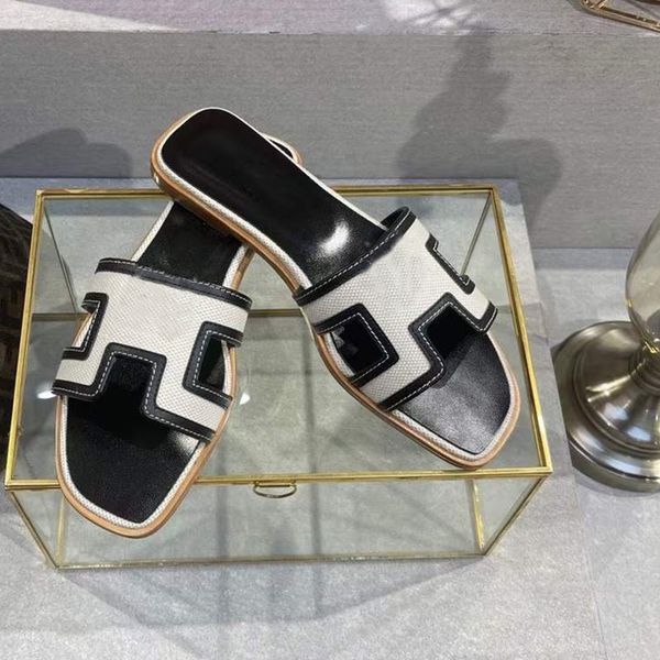 women oran sandal designer slippers genuine leather sandal flat flip flop black and white stitching luxury party wedding slipper with box 34
women oran sandal designer slippers genuine leather sandal flat flip flop black and white stitching luxury party wedding slipper with box 34