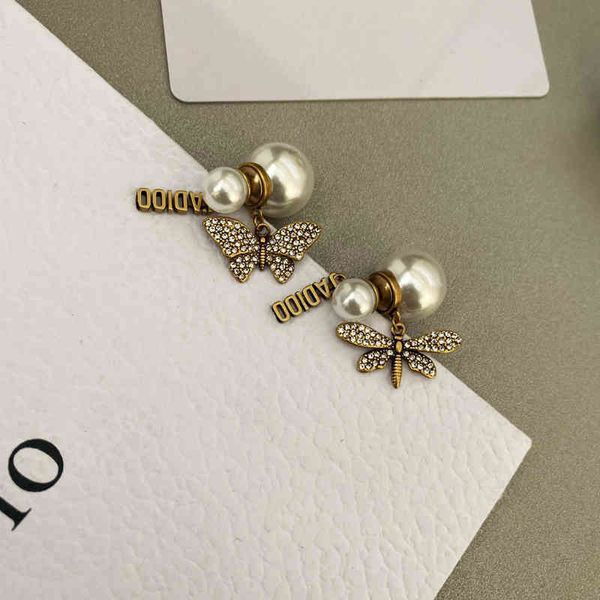 new letter full diamond butterfly pearl earrings fashion personality versatile s925 tremella jewelry, Golden
new letter full diamond butterfly pearl earrings fashion personality versatile s925 tremella jewelry, Golden