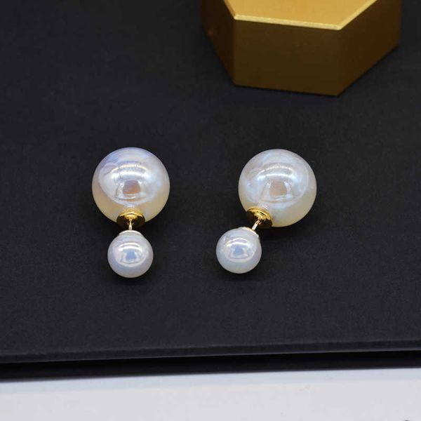 ji mermaid pearl earrings wear double-sided korean earrings before and after. women's high-quality new net red silver needle 003
ji mermaid pearl earrings wear double-sided korean earrings before and after. women's high-quality new net red silver needle 003