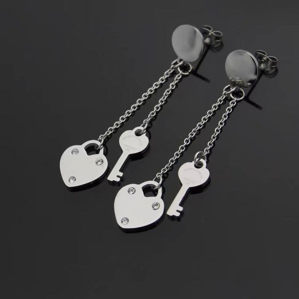high polished classic style women lover heart tassel studs 3 color luxury brand titanium steel earrings logo printed wedding party gifts who, Golden;silver
high polished classic style women lover heart tassel studs 3 color luxury brand titanium steel earrings logo printed wedding party gifts who, Golden;silver