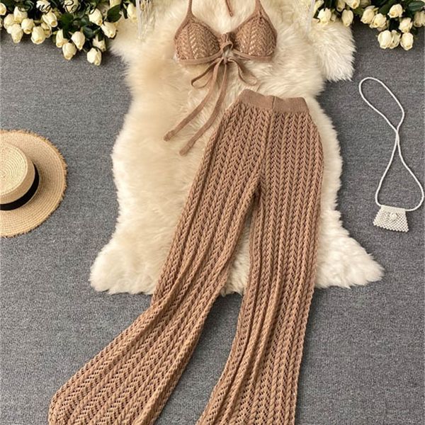 singreiny women summer design knitted set backless halter short chic hollow knitted wide leg long pants two piece suit 220602, Gray
singreiny women summer design knitted set backless halter short chic hollow knitted wide leg long pants two piece suit 220602, Gray
