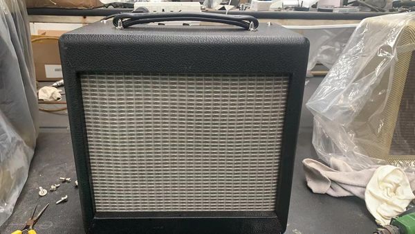 custom grand handwired point to point guitar amp combo 5w in black color 10 inch speaker
custom grand handwired point to point guitar amp combo 5w in black color 10 inch speaker
