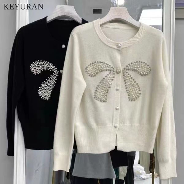 women knitted cardigan sweater autumn winter o-neck love buttons bow beading long sleeve sweaters coat solid femme knitwear, White;black
women knitted cardigan sweater autumn winter o-neck love buttons bow beading long sleeve sweaters coat solid femme knitwear, White;black