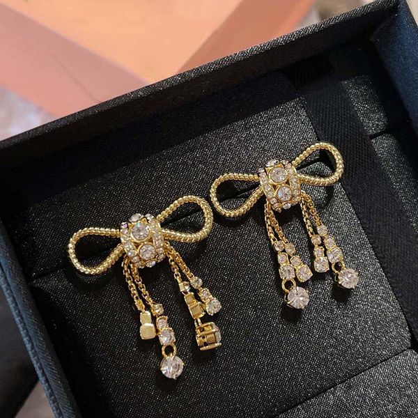 designer trendy french bow studs micro-inlaid zircon tassel earrings luxury sweet stud, Golden;silver
designer trendy french bow studs micro-inlaid zircon tassel earrings luxury sweet stud, Golden;silver