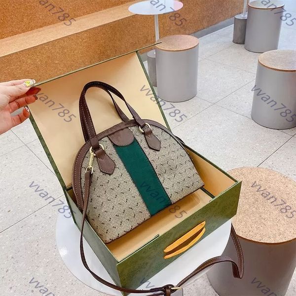 luxury messenger bags womens shell handbagdesigner classic red and green shoulder european american fashion contrast color portable bag
luxury messenger bags womens shell handbagdesigner classic red and green shoulder european american fashion contrast color portable bag