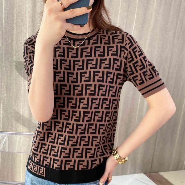 spring and knitted short slim fitting thin outer wear foreign style half sleeved bottomed brand summer women's shirt, White
spring and knitted short slim fitting thin outer wear foreign style half sleeved bottomed brand summer women's shirt, White