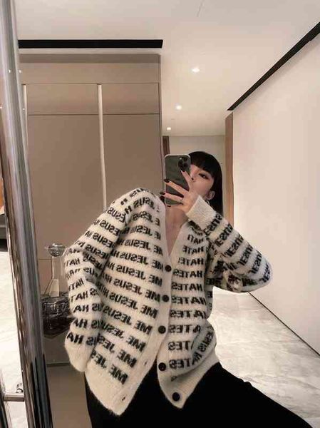 women's sweaters spring and summer loose temperament korean single breasted knitted thin cardigan striped sweater, White;black
women's sweaters spring and summer loose temperament korean single breasted knitted thin cardigan striped sweater, White;black