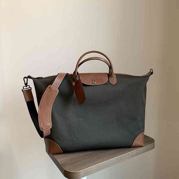 fashion design women's brand hand bag wallet nieuwe reistas oxford doek mannen en vrouwen korte draagbare grote grootte cross dumplings
fashion design women's brand hand bag wallet nieuwe reistas oxford doek mannen en vrouwen korte draagbare grote grootte cross dumplings