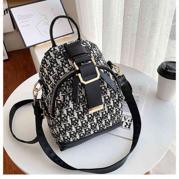 canvas backpack small backpack versatile women's single shoulder messenger bag 
canvas backpack small backpack versatile women's single shoulder messenger bag