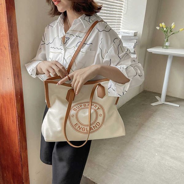 spot canvas womens new large capacity nylon shoulder bag korean ins style fashion portable tote bag
spot canvas womens new large capacity nylon shoulder bag korean ins style fashion portable tote bag