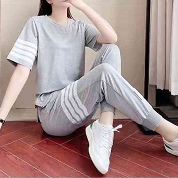 sportswear women's summer style thin short sleeved t-shirt trousers four bars loose running suit leisure two-piece set, White
sportswear women's summer style thin short sleeved t-shirt trousers four bars loose running suit leisure two-piece set, White