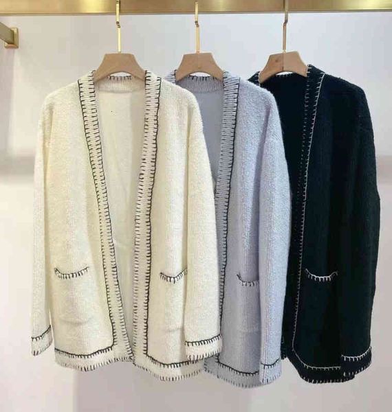 women's knits tees trading company hand stitched thickened knitted cashmere coat cardigan female, White
women's knits tees trading company hand stitched thickened knitted cashmere coat cardigan female, White