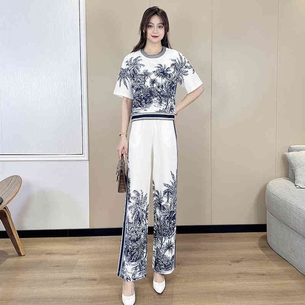 women's two piece pants summer coconut black and white round neck printed t-shirt elastic waist slacks two-piece set
women's two piece pants summer coconut black and white round neck printed t-shirt elastic waist slacks two-piece set