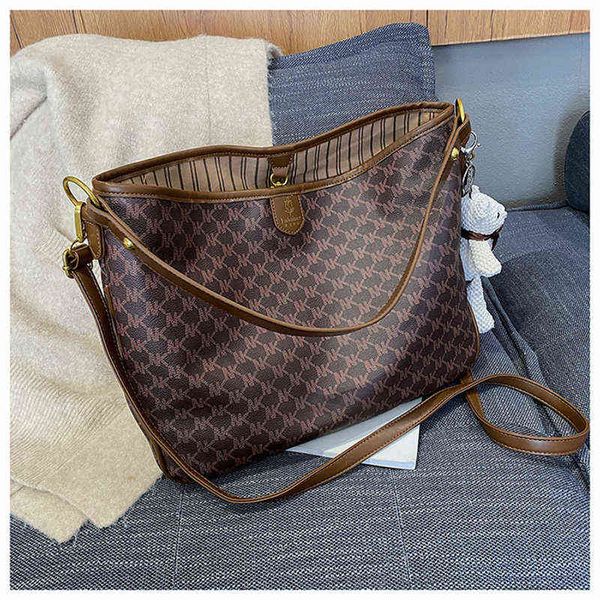 niche brand printed versatile shopping bag fashion texture shoulder messenger bag large capacity soft tote bag for women 220510
niche brand printed versatile shopping bag fashion texture shoulder messenger bag large capacity soft tote bag for women 220510
