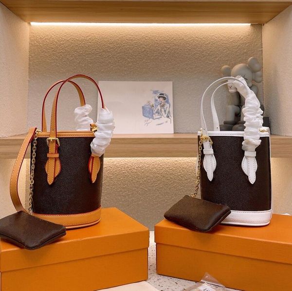 2022 designer new drawstring bucket bag hand-held one-shoulder coin purse two-piece set nano bucket
2022 designer new drawstring bucket bag hand-held one-shoulder coin purse two-piece set nano bucket