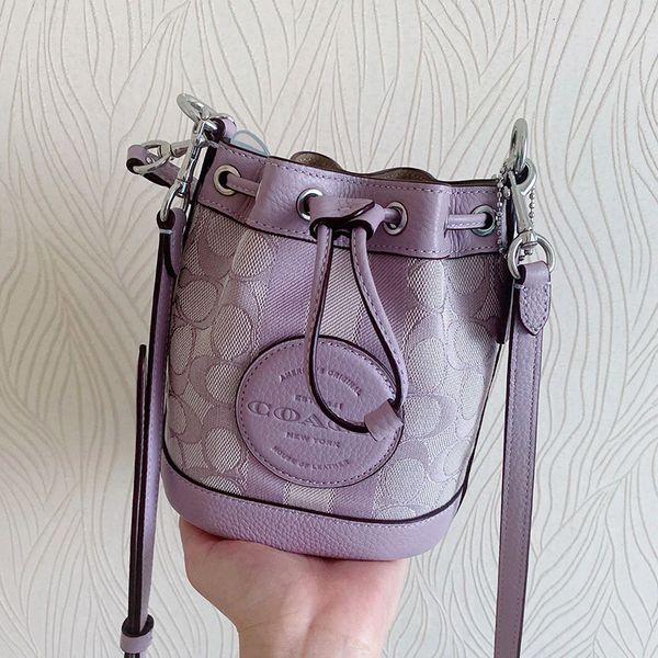 designer bags 22 olai new dempsey bucket purple jacquard mini round cake with one shoulder messenger for women
designer bags 22 olai new dempsey bucket purple jacquard mini round cake with one shoulder messenger for women