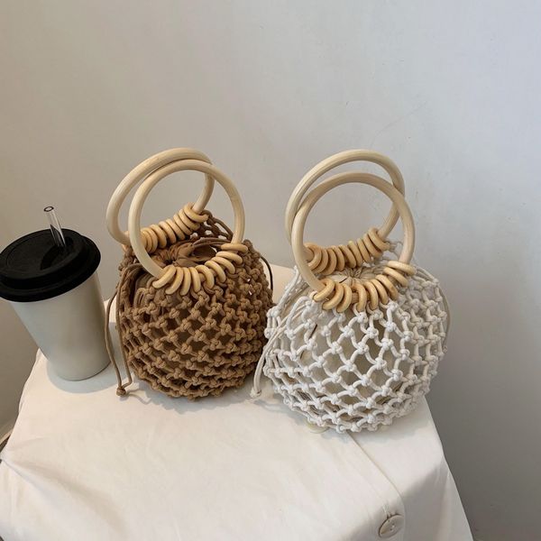 2020 new woman girl fashionable woven handbag beach style wood handle drawstring bucket tote purse for daily life and vacation
2020 new woman girl fashionable woven handbag beach style wood handle drawstring bucket tote purse for daily life and vacation