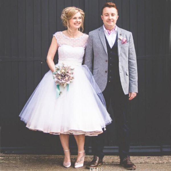 stunning tea length tulle wedding dresses sheer bateau neckline a line cap sleeves white summer simple plus size short beach bridal gowns
stunning tea length tulle wedding dresses sheer bateau neckline a line cap sleeves white summer simple plus size short beach bridal gowns