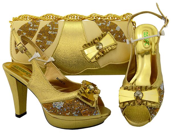 Fashionable gold women pumps with rhinestone and big crystal bowtie design heel 11CM african shoes match handbag set for dress MM1048
Fashionable gold women pumps with rhinestone and big crystal bowtie design heel 11CM african shoes match handbag set for dress MM1048