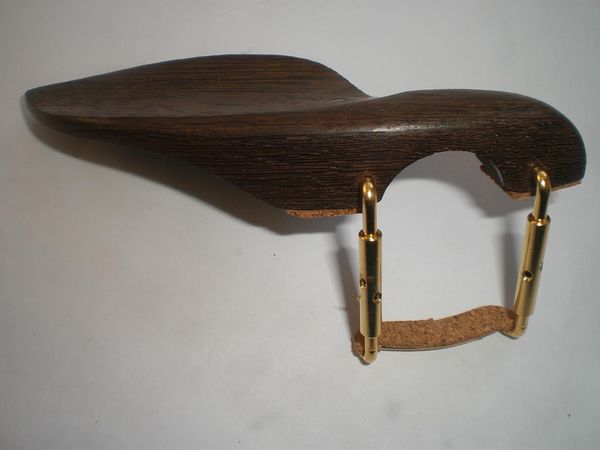 1 pc wenge wood chin rest with holes and gold color clamp with soft wood attached 4/4
1 pc wenge wood chin rest with holes and gold color clamp with soft wood attached 4/4