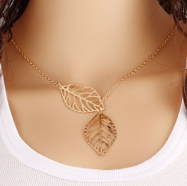 100pcs/lot fashion double leaf pendant necklace silver golden women chain necklace 2016 july style in stock
100pcs/lot fashion double leaf pendant necklace silver golden women chain necklace 2016 july style in stock