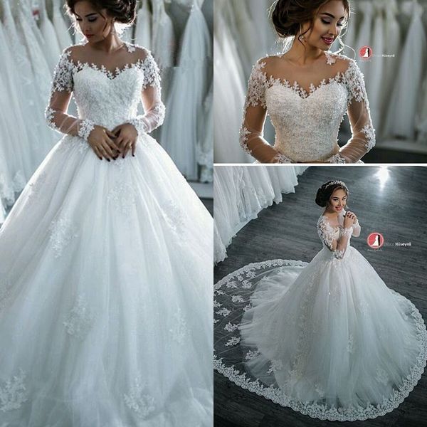 2016 romantic sheer long sleeves wedding dresses sheer neck lace appliques sequins a line ball gown bridal gowns custom made wedding gowns, White
2016 romantic sheer long sleeves wedding dresses sheer neck lace appliques sequins a line ball gown bridal gowns custom made wedding gowns, White