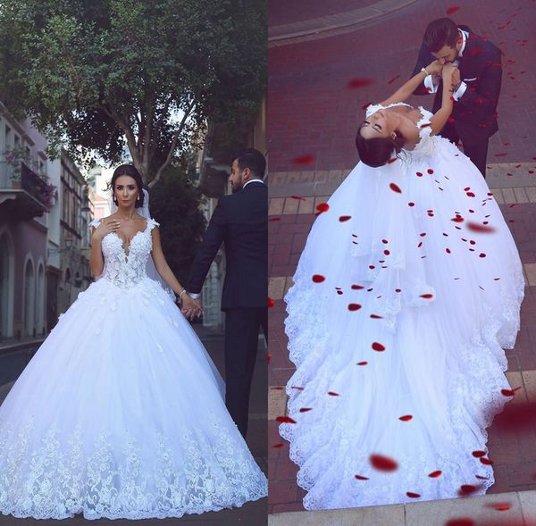 2016 fall winter white tulle deep v neck long wedding dresses ball gown lace appliques hand made flowers chapel train bridal gowns
2016 fall winter white tulle deep v neck long wedding dresses ball gown lace appliques hand made flowers chapel train bridal gowns