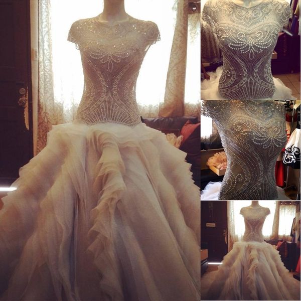 luxury wedding dresses a line jewel capped short sleeves pearls beading crystal bodice covered buttons tiered chapel train bridal gowns, White
luxury wedding dresses a line jewel capped short sleeves pearls beading crystal bodice covered buttons tiered chapel train bridal gowns, White