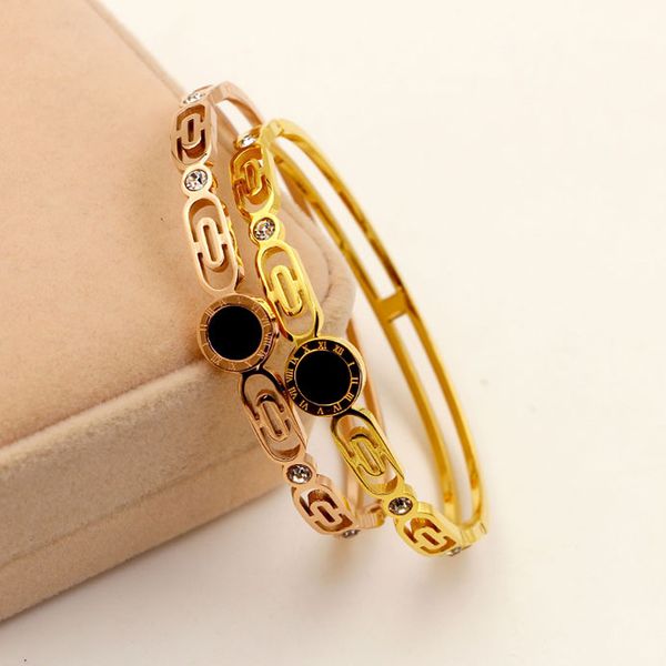 the new pattern of black dark hollow circle rome digital fashion bracelet titanium bracelet jewelry accessories fashionista
the new pattern of black dark hollow circle rome digital fashion bracelet titanium bracelet jewelry accessories fashionista