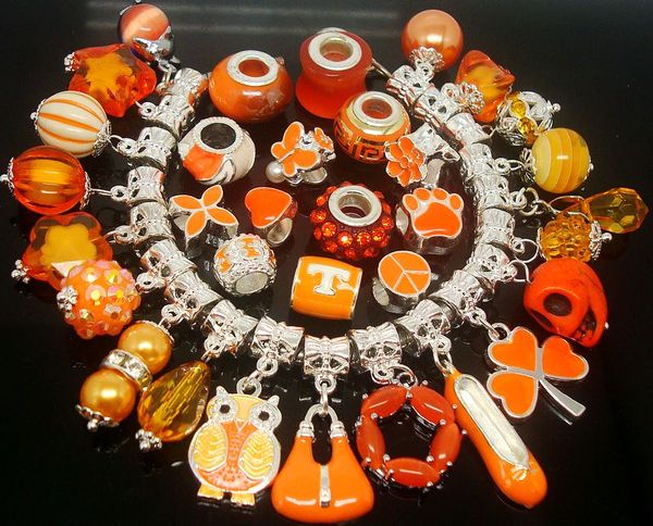 wholesale in bulk 100pcs/lot mixed orange color charms for jewelry making loose diy big hole charms for european bracelet, Bronze;silver
wholesale in bulk 100pcs/lot mixed orange color charms for jewelry making loose diy big hole charms for european bracelet, Bronze;silver