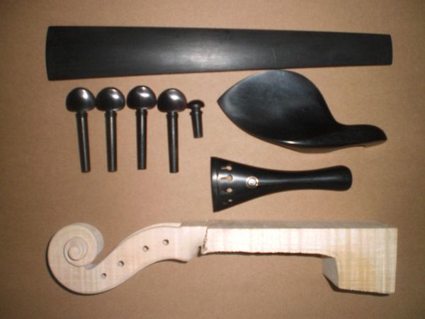 1 set ebony violin fitting 4/4 including tail piece chin rest and pegs ends plus violin head and ebony fingerboard all 4/4
1 set ebony violin fitting 4/4 including tail piece chin rest and pegs ends plus violin head and ebony fingerboard all 4/4