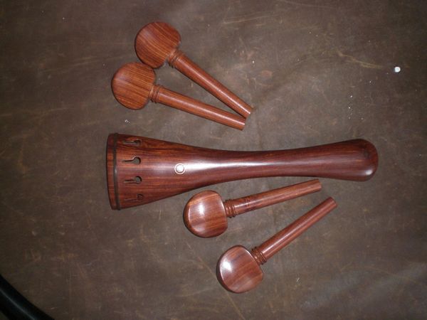 1 set cello fitting 4/4 rose wood including cello tail piece & 4 cello pegs rose wood cello parts
1 set cello fitting 4/4 rose wood including cello tail piece & 4 cello pegs rose wood cello parts