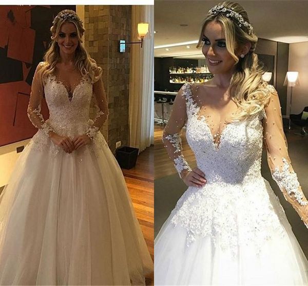 2017 new modern wedding dresses a line jewel neck illusion long sleeves lace appliques beads sweep train button back plus size bridal gowns, White
2017 new modern wedding dresses a line jewel neck illusion long sleeves lace appliques beads sweep train button back plus size bridal gowns, White